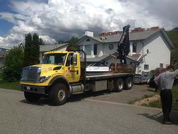 Home Building Centre Delivering Roofing Material To A Customer